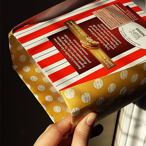 cut and fold craft paper as needed around box and use Scotch tape to attach.